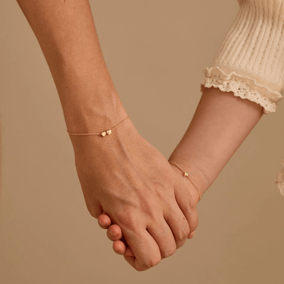 Gepersonaliseerde armband met initiaal hartjes